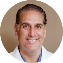 Dr. Lloyd Klausner, DMD